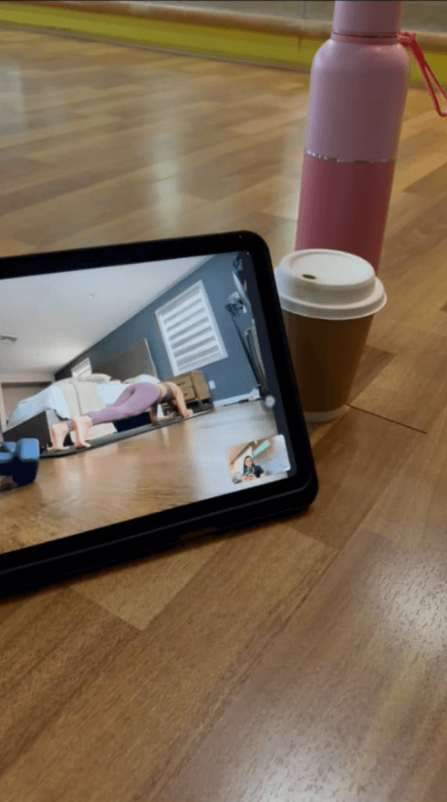 Live online yoga session on a tablet — practice from home